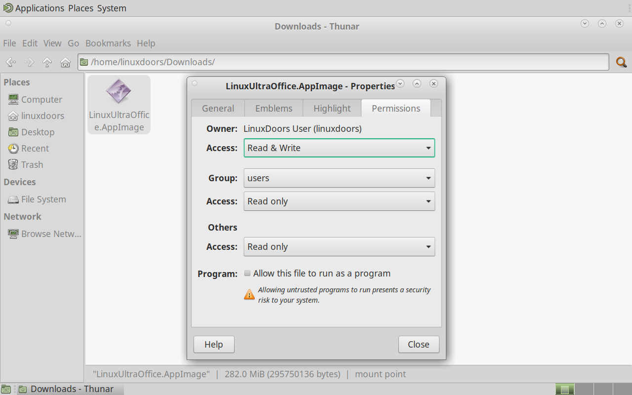The Permissions tab, unchecked, showing the Allow this file to run as a program checkbox with a security warning below it